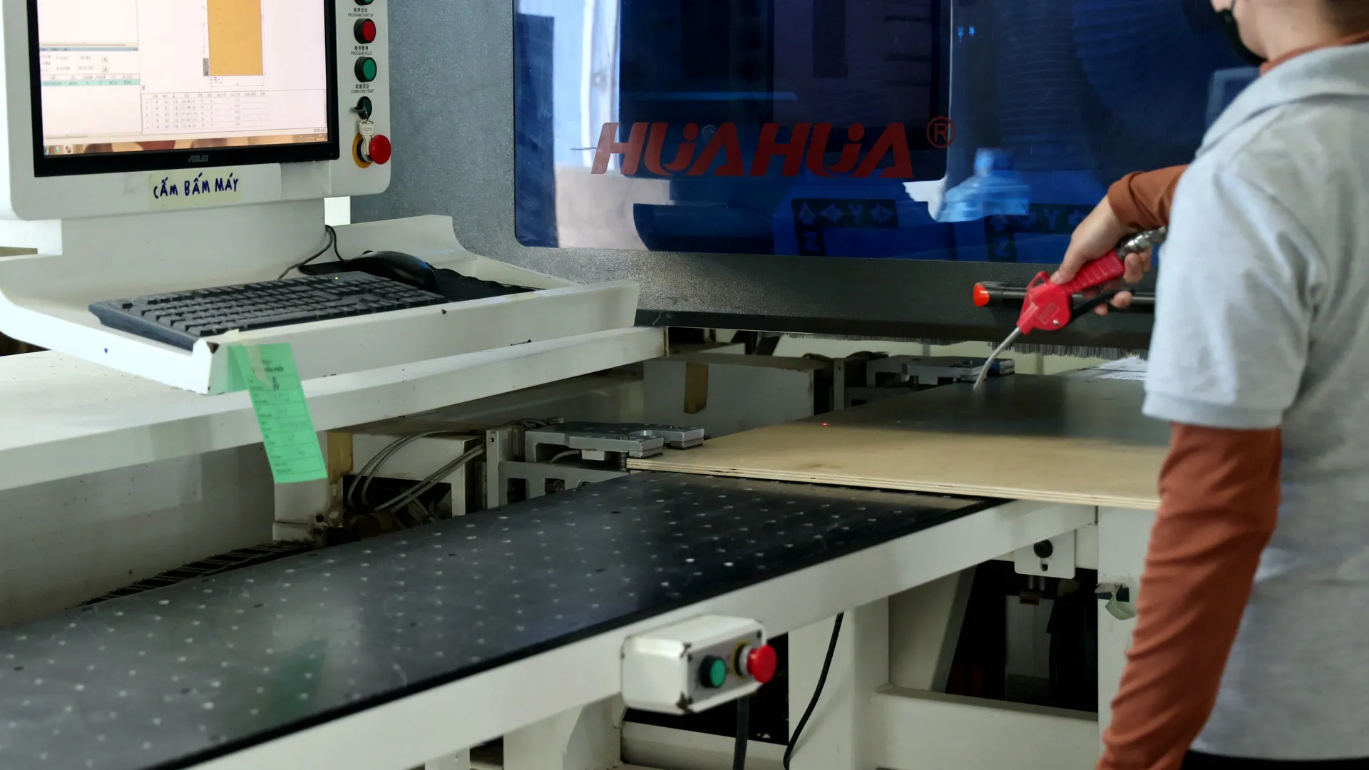 CNC machine cutting cabinet components